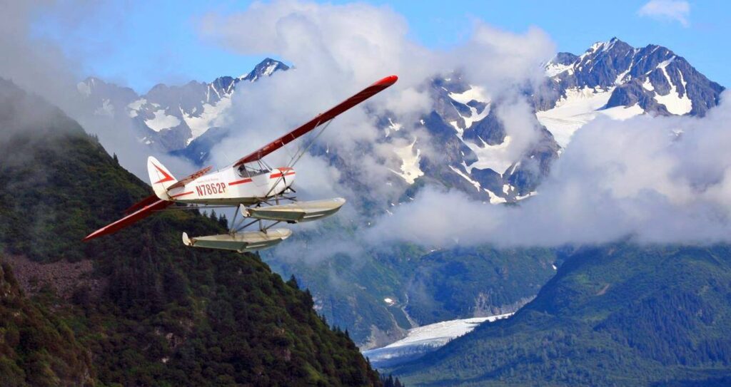 float plane flying in alaska